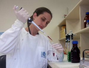 Dr Camila Zanluca, PhD, working in Claudia's lab