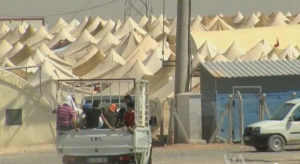 Syrian refugee camp on the Turkish border (image from WikiCommons)