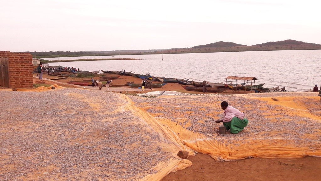 Fishing is a big part of the Bugoto community as can be seen from nets laid out and the fishing boats in the photo. Photo credit: Dr Poppy Lamberton
