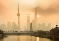 Shanghai Financial Center and modern skyscraper city in misty go