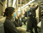 Swine_Flu_Masked_Train_Passengers_in_Mexico_City