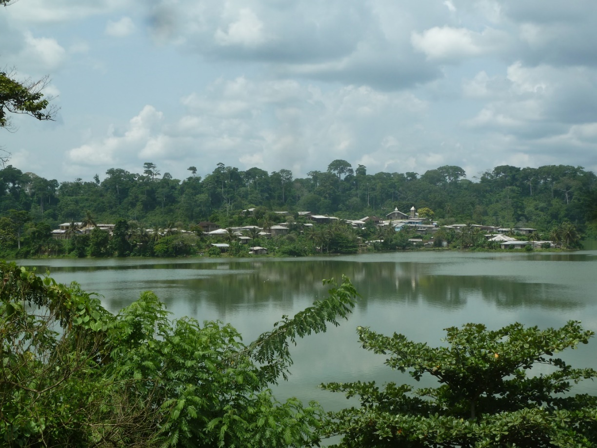 A view of the central island with its associated village within Lake Barombi Kotto
