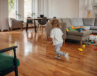 Child playing in living room at home