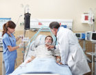 800px-Clinicians_in_Intensive_Care_Unit