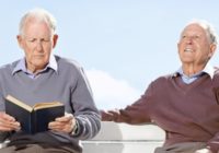 Retired senior man reading a novel – Outdoor
