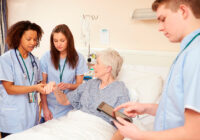 Nurses assessing a patient