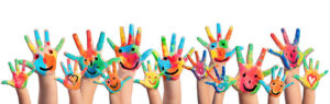Colorfully painted hands of children