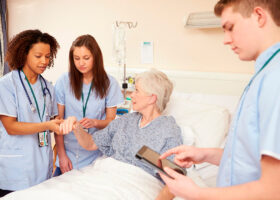 Nurses assessing a patient